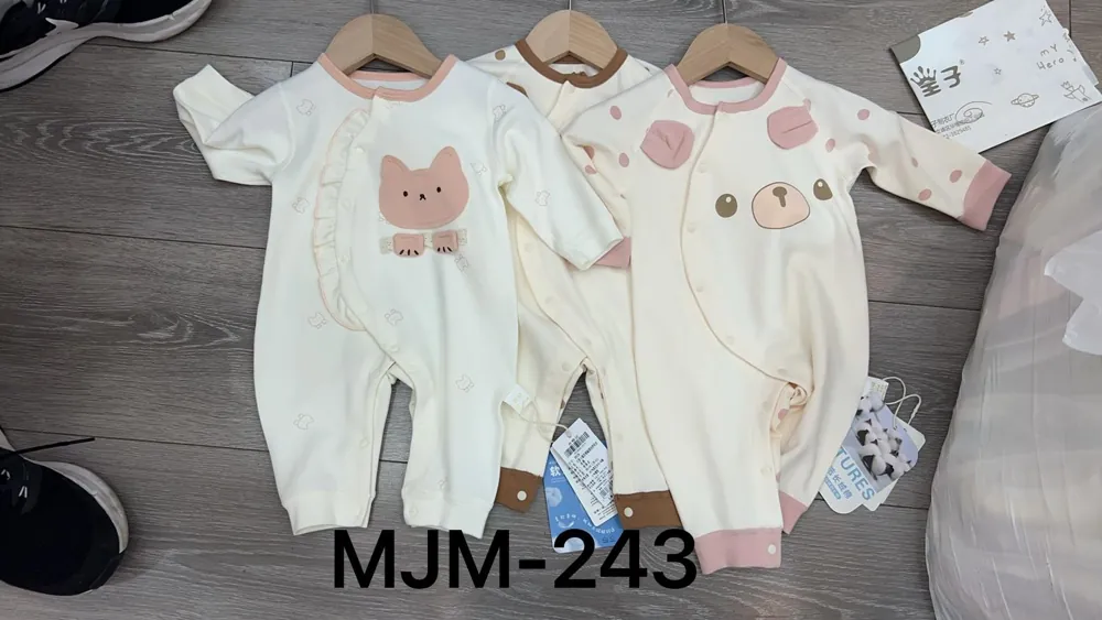 Cream baby rompers with bear motifs